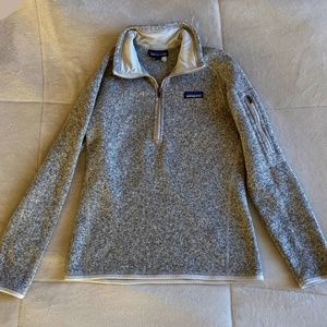 Women's Patagonia quarter zip pull over in size Small in color tan.